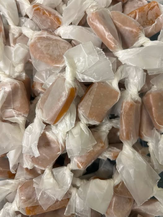Wrapped salted caramels piled high — back in the case per the shop’s August 15, 2026 Facebook post